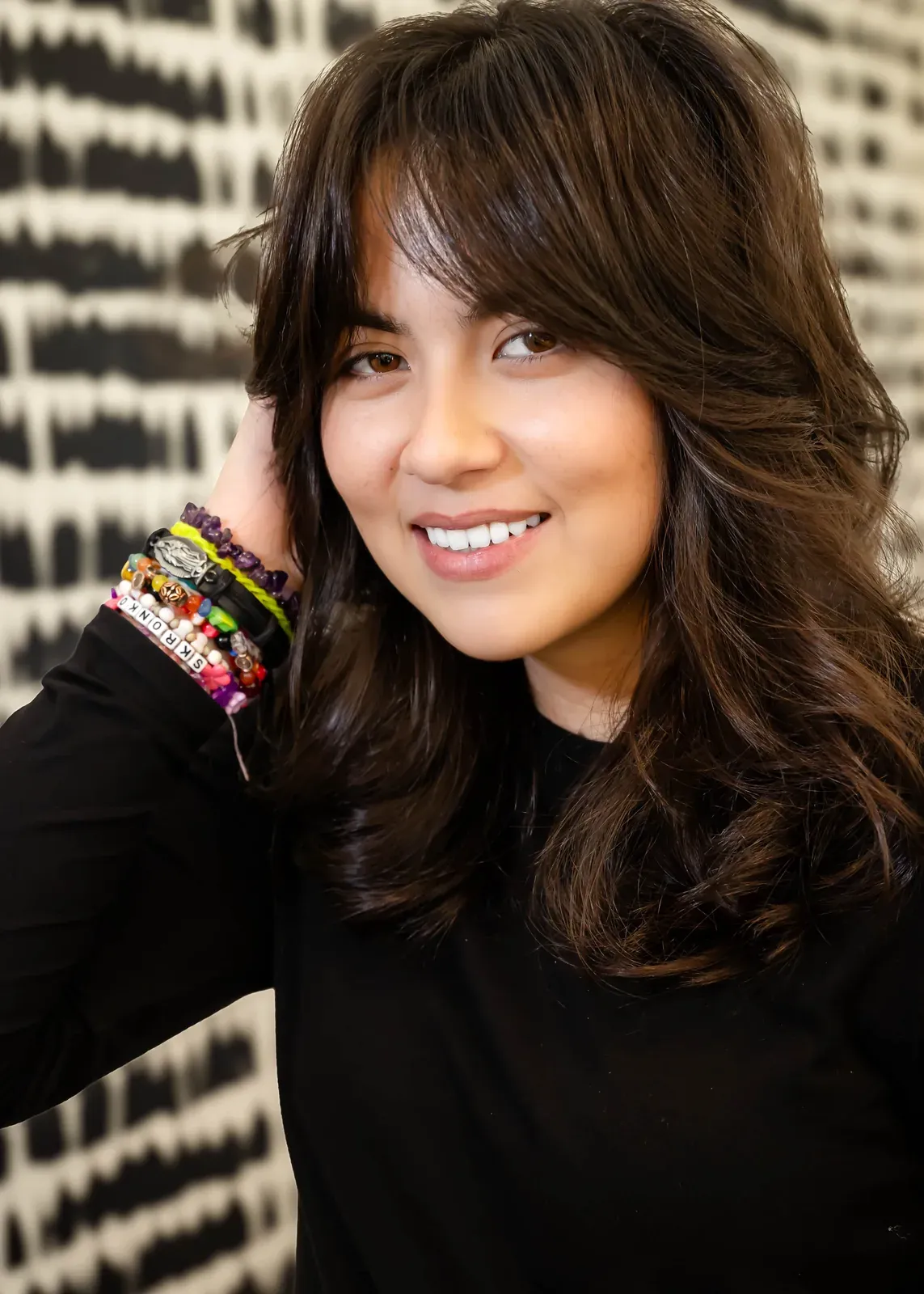 Curtain bangs cut by James Fojt at Ceron Hair Studio, Houston